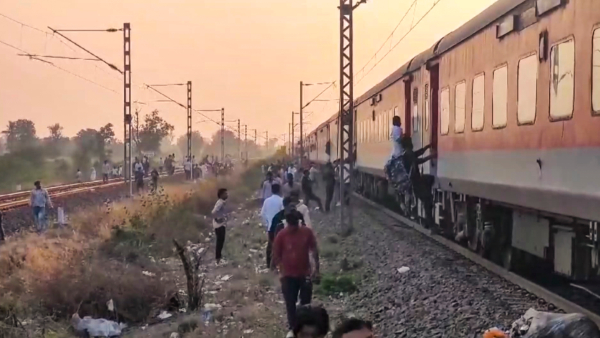People at the site following the death of several passengers after they stepped down due to a rumour of fire and were run over by another train passing on the adjacent tracks in North Maharashtra s Jalgaon district Wednesday Jan 22 2025