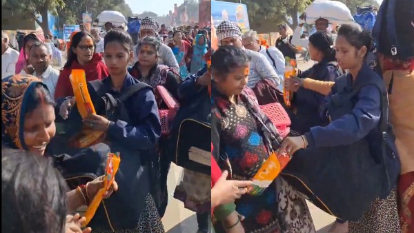 Woman Distributes Sanitary Pads At Kumbh Woman Distributes Sanitary Pads At Kumbh