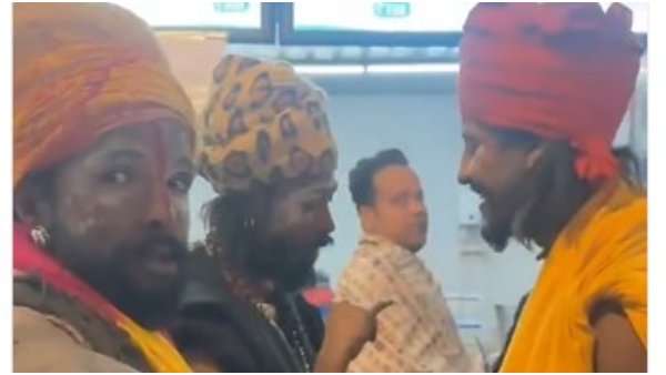 Woman Films Sadhus Ordering Pizza