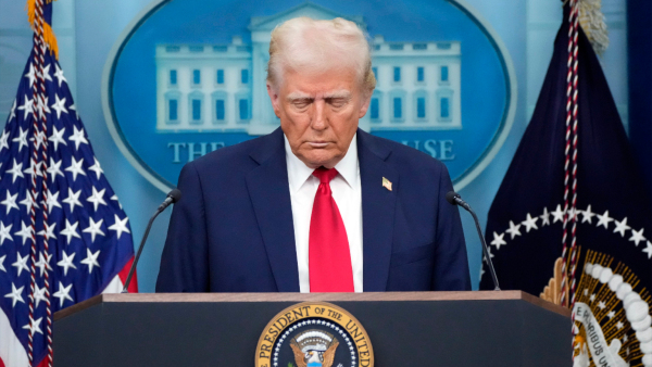 President Donald Trump pauses for a moment of silence before he speaks in the James Brady Press Briefing Room at the White House Thursday Jan 30 2025 in Washington