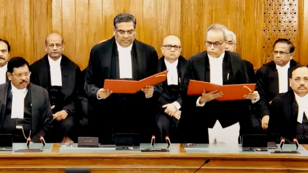 Chief Justice of India CJI Sanjiv Khanna administers the oath of office to Justice Joymalya Bagchi a judge of the Calcutta High Court as a Supreme Court judge