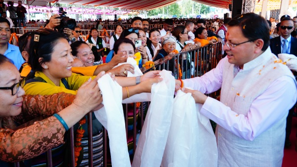 CM Pushkar Singh Dhami meeting women