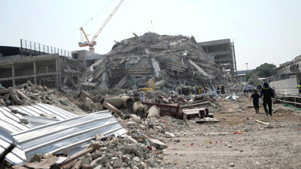 Rescuers work at the site of a high-rise building under construction that collapsed after a 7 7 magnitude earthquake in Bangkok Thailand Friday March 28 2025