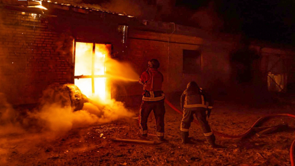 In this photo provided by the Ukrainian Emergency Service emergency services personnel work to extinguish a fire following a Russian attack in Kyiv Ukraine Thursday April 10 2025