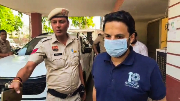 Ashoka University professor Ali Khan Mahmudabad being escorted by police personnel after his arrest in Sonipat Haryana Sunday May 18 2025 The Supreme Court on Wednesday granted interim bail to Mahmudabad arrested for his alleged offensive social media posts on Operation Sindoor but refused to stay the investigation against him