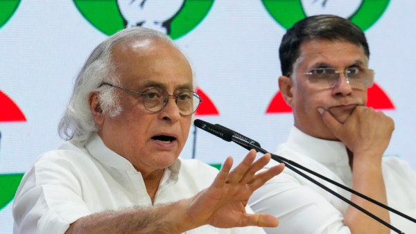 Congress leader Jairam Ramesh with party leader Pawan Khera Congress leader Jairam Ramesh with party leader Pawan Khera