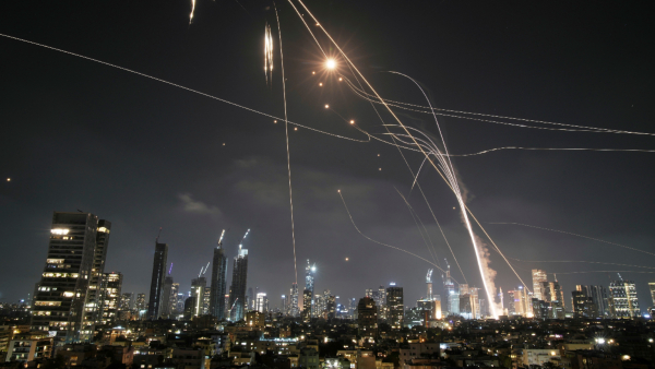 The Israeli Iron Dome air defense system fires to intercept missiles over Tel Aviv Israel