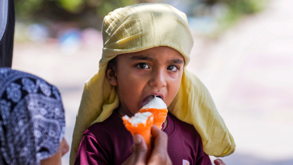 A child eat an ice-cream to beat the heat during a summer afternoon in New Delhi Sunday June 8 2025 A child eat an ice-cream to beat the heat during a summer afternoon in New Delhi Sunday June 8 2025