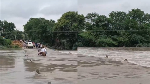 Karnataka Floods Hagari River Overflows in Siruguppa Biker Swept Away in Hubballi Karnataka Floods Hagari River Overflows in Siruguppa Biker Swept Away in Hubballi