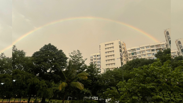 Weather Alert Bengaluru s Evening Sky Dazzles with Rainbow After Sunset Showers