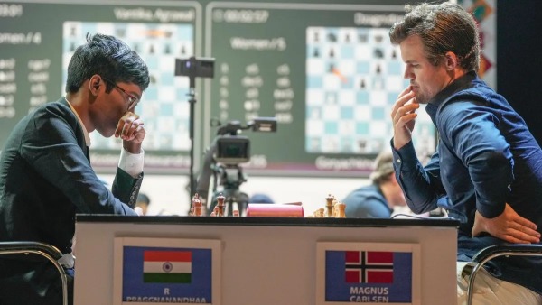 R Praggnanandhaa and Magnus Carlsen