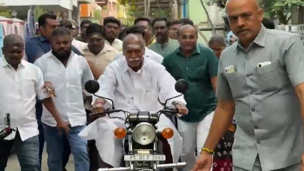 Puducherry Elections CM N Rangaswamy Rides Bike To Cast Vote Continues Decades-Old Tradition