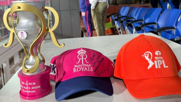 Virat Kohli signs cap for Vaibhav Sooryavanshi Virat Kohli signs cap for Vaibhav Sooryavanshi