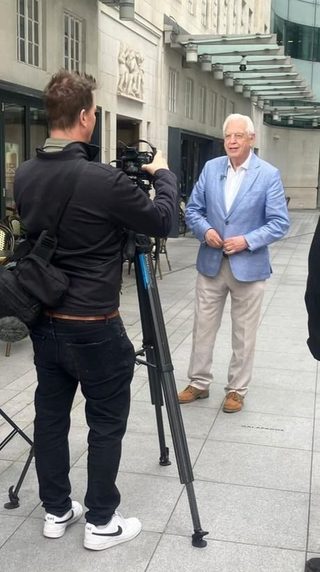 BBC World Affairs Editor John Simpson being filmed outside Broadcasting House BBC World Affairs Editor John Simpson being filmed outside Broadcasting House