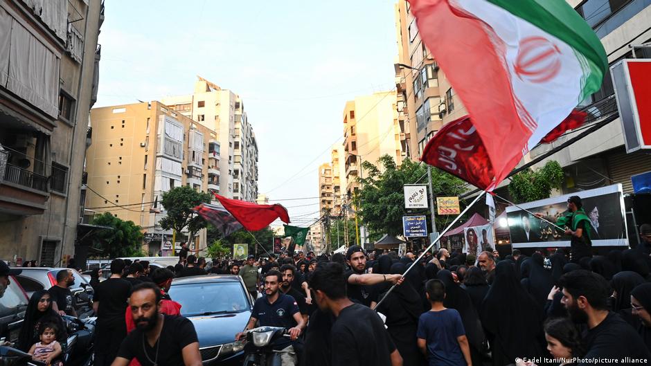 After a ceasefire between Israel and Hezbollah was announced locals in Beirut s southern suburbs celebrated with some waving Iranian flags After a ceasefire between Israel and Hezbollah was announced locals in Beirut s southern suburbs celebrated with some waving Iranian flags