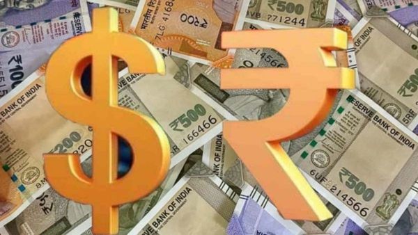 Indian Rupee currency symbol against US dollar banknotes Indian Rupee currency symbol against US dollar banknotes