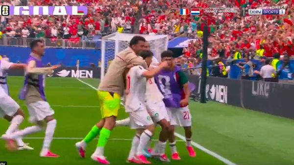 Morocco players celebrating 3-0 FIFA World Cup victory Morocco players celebrating 3-0 FIFA World Cup victory