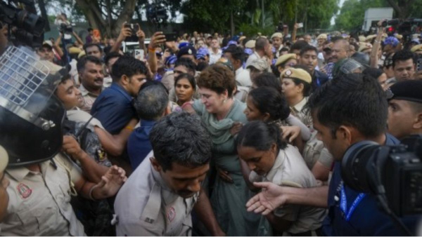 Pic Credit ANI - Priyanka Gandhi being taken from the protest site