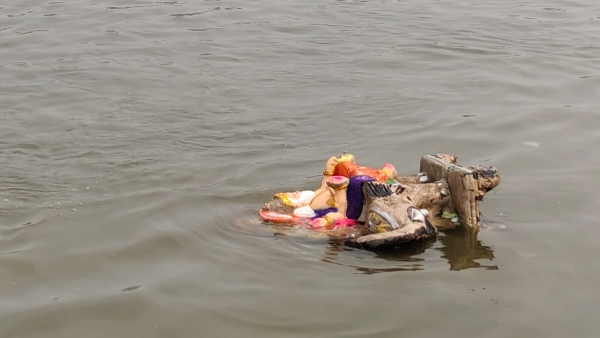 Lord Vishwakarma Idol Floating in Yamuna Lord Vishwakarma Idol Floating in Yamuna
