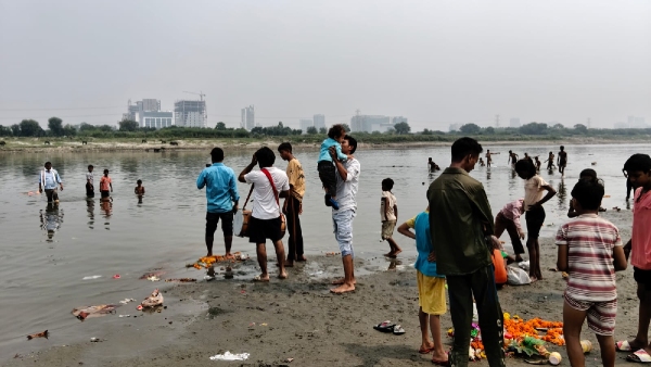 People Doing Idol Visarjan at Yamuna River People Doing Idol Visarjan at Yamuna River