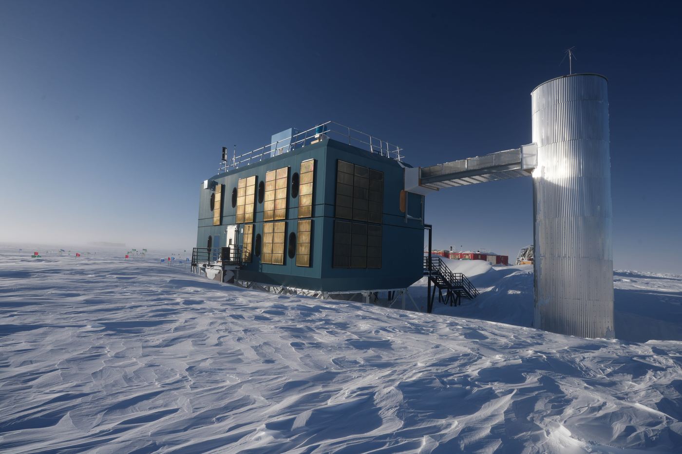 The IceCube Laboratory under a deep blue polar sky