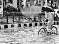 Rain disrupts normal life in Bengaluru Rain disrupts normal life in Bengaluru