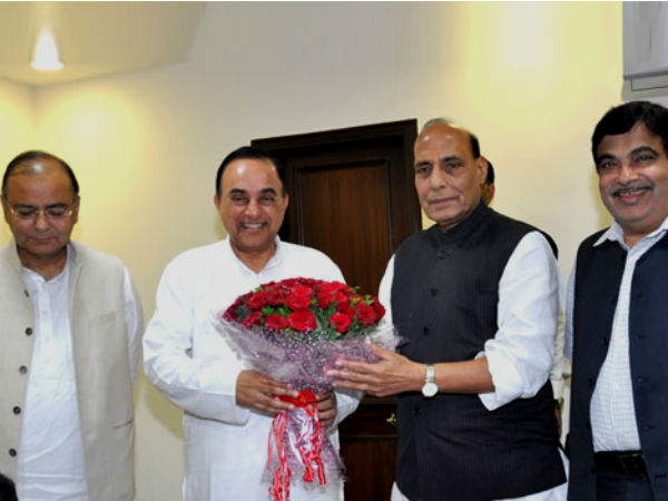 subramanian-swamy-joins-bjp-along-with-janata-party-rajnath-singh subramanian-swamy-joins-bjp-along-with-janata-party-rajnath-singh