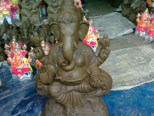 Perform pooja to Eco-friendly clay Ganesha