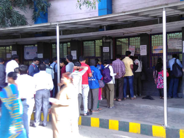 December 1: people take a bus pass to give old notes 