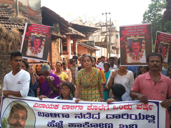 Family members stage silent march on the first death anniversary of Vinayak Baliga Family members stage silent march on the first death anniversary of Vinayak Baliga
