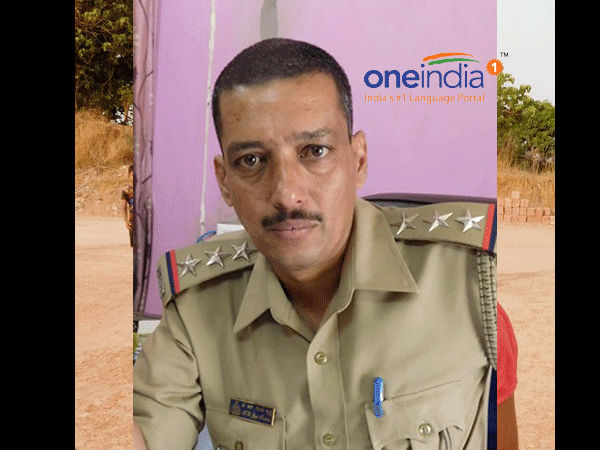 Ullal Inspector Gopikrishn shares a helping hand to an old age person 