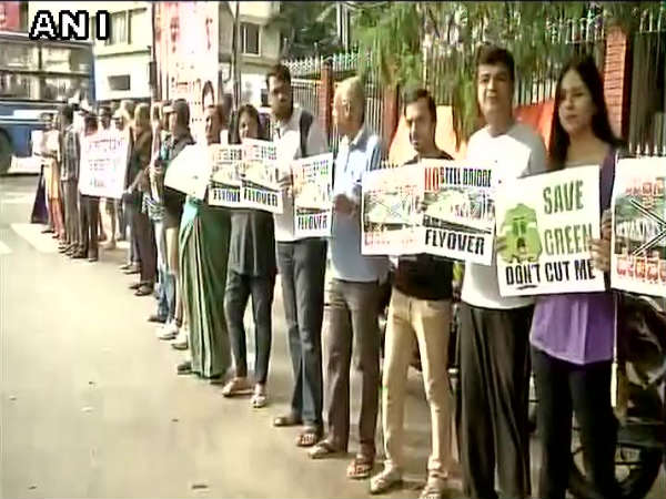 Bengaluru: Locals hold silent protest against steel flyover at Shivananda Circle