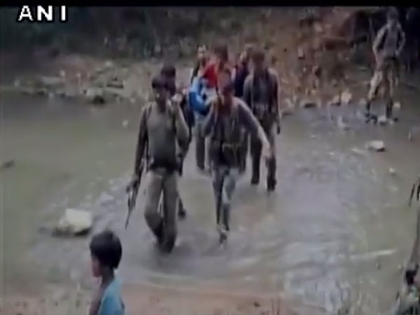 CRPF personnel carried sick tribal women on foot for 7 km CRPF personnel carried sick tribal women on foot for 7 km