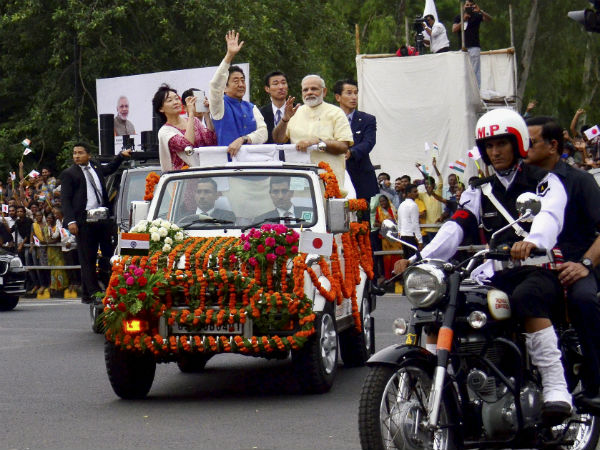 PM Narendra Modi receives Japanese PM Shinzo Abe and his wife Akie Abe at Ahmedabad Airport