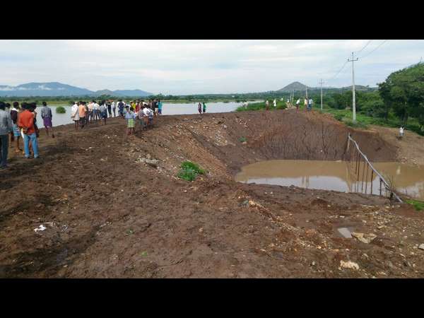 Due to heavy rain in Chamarajanagara district, A small dam in Gundlupet has broken