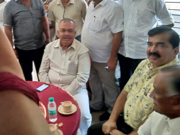 Home Ministers chit chat with Mohan Alva photo goes viral on social media with negative vibes Home Ministers chit chat with Mohan Alva photo goes viral on social media with negative vibes