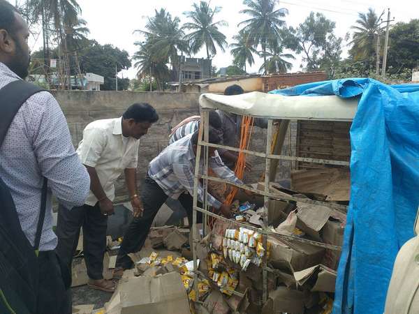 liquor full of Van met with an accident near Tumkur