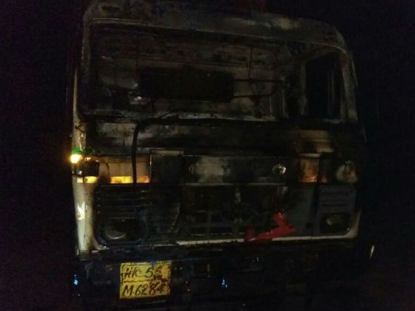 Driver burnt alive as container lorry catches fire at Nelamangala Driver burnt alive as container lorry catches fire at Nelamangala