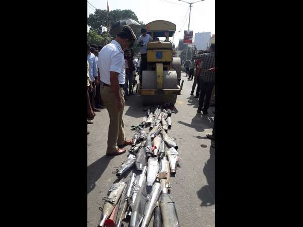 Police destroy fancy bike silencers Police destroy fancy bike silencers