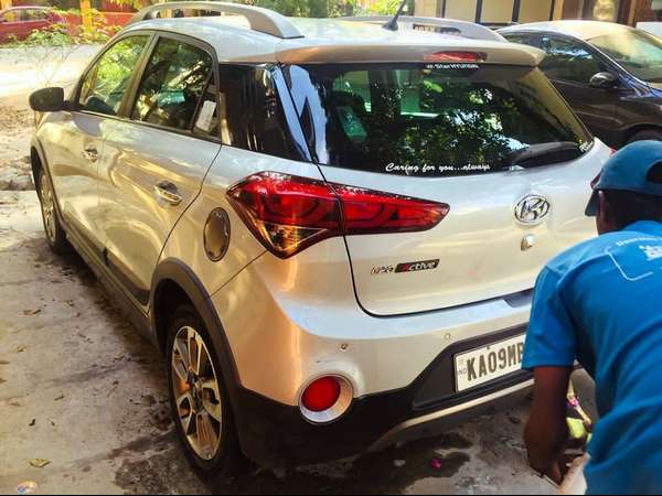 Chamarajanagara boy discovers a easy way to car service with minimal use of water