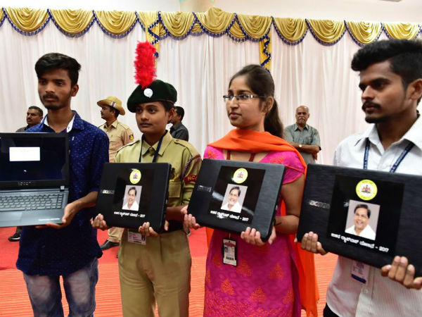 Siddaramaiah distributes free laptops to students