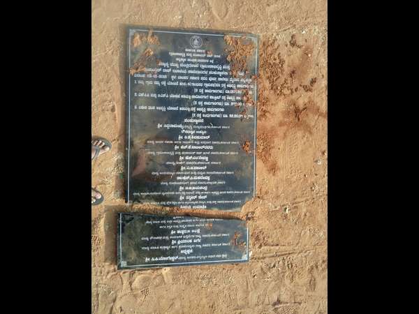 Development works name board damaged in Channapatna