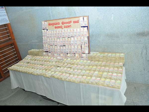 2.2 crore worth demonetized bank notes sized in Bengaluru 