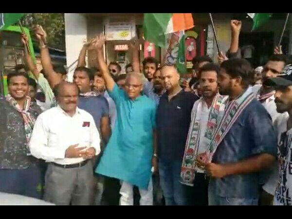 JDS Congress activists celebrated victory on Saturday in Mangalore. 