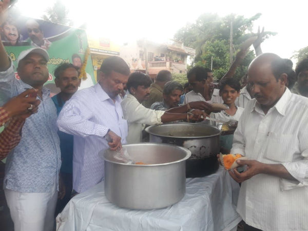 Kumaraswamy fans anointed milk for Kumaraswamys portrait.