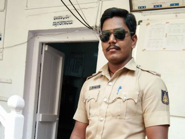 constable suspend for asking Kumaraswamy to resign 