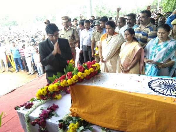Vijayananda Suresh Nayak (29) was cremated with all government honors 