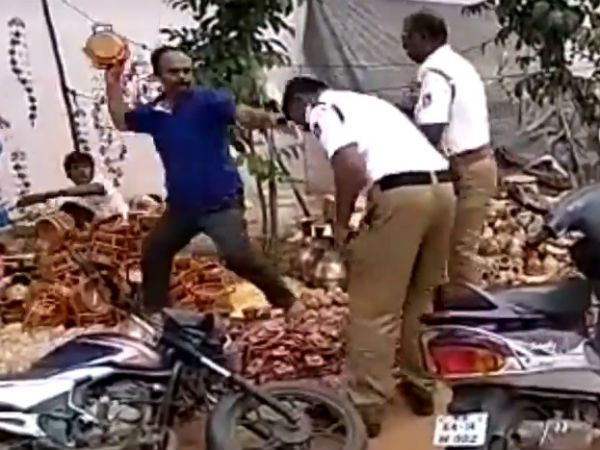Drunken man assault two traffic policemen in Davangere Drunken man assault two traffic policemen in Davangere