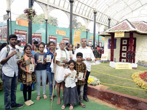 Lalbagh Flower Show : Mahatma Gandhiji Autobiography distributed 