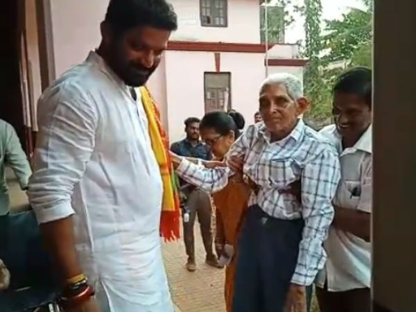 Congress candidate Mithun Rai who helped the senior citizen